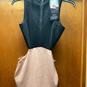 BRAND NEW PEEKABOO DRESS SIZE L